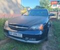 Синій Шевроле Еванда, об'ємом двигуна 2 л та пробігом 244 тис. км за 1800 $, фото 1 на Automoto.ua