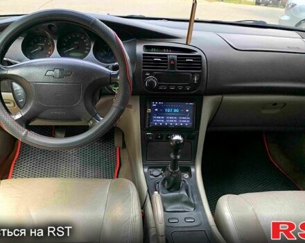Синий Шевроле Эванда, объемом двигателя 2 л и пробегом 191 тыс. км за 2850 $, фото 7 на Automoto.ua