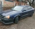 Синий Шевроле Эванда, объемом двигателя 2 л и пробегом 230 тыс. км за 1950 $, фото 1 на Automoto.ua