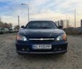 Синий Шевроле Эванда, объемом двигателя 2 л и пробегом 300 тыс. км за 4099 $, фото 1 на Automoto.ua