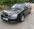 Синий Шевроле Эванда, объемом двигателя 2 л и пробегом 190 тыс. км за 3700 $, фото 1 на Automoto.ua