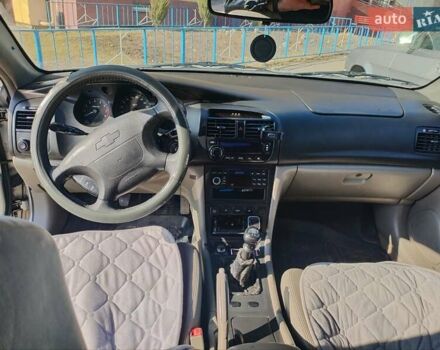 Синий Шевроле Эванда, объемом двигателя 2 л и пробегом 260 тыс. км за 3500 $, фото 4 на Automoto.ua