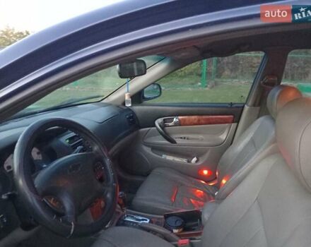 Синий Шевроле Эванда, объемом двигателя 2 л и пробегом 265 тыс. км за 3000 $, фото 6 на Automoto.ua
