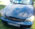 Синій Шевроле Еванда, об'ємом двигуна 2 л та пробігом 320 тис. км за 2100 $, фото 1 на Automoto.ua