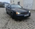 Синий Шевроле Эванда, объемом двигателя 2 л и пробегом 270 тыс. км за 2499 $, фото 2 на Automoto.ua