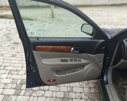 Синий Шевроле Эванда, объемом двигателя 2 л и пробегом 270 тыс. км за 2499 $, фото 9 на Automoto.ua