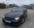 Синий Шевроле Эванда, объемом двигателя 2 л и пробегом 270 тыс. км за 2499 $, фото 1 на Automoto.ua