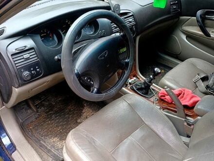 Синій Шевроле Еванда, об'ємом двигуна 2 л та пробігом 192 тис. км за 4200 $, фото 1 на Automoto.ua