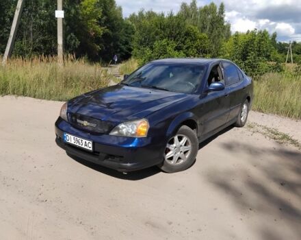 Синій Шевроле Еванда, об'ємом двигуна 2 л та пробігом 400 тис. км за 2449 $, фото 1 на Automoto.ua