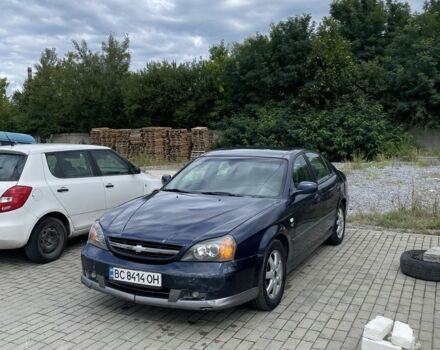 Синій Шевроле Еванда, об'ємом двигуна 2 л та пробігом 240 тис. км за 2000 $, фото 1 на Automoto.ua