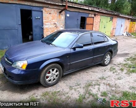 Синий Шевроле Эванда, объемом двигателя 2 л и пробегом 400 тыс. км за 2450 $, фото 1 на Automoto.ua