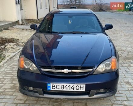 Синий Шевроле Эванда, объемом двигателя 2 л и пробегом 240 тыс. км за 2200 $, фото 1 на Automoto.ua