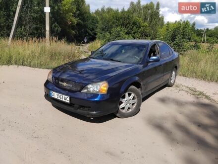 Синій Шевроле Еванда, об'ємом двигуна 2 л та пробігом 400 тис. км за 2450 $, фото 1 на Automoto.ua