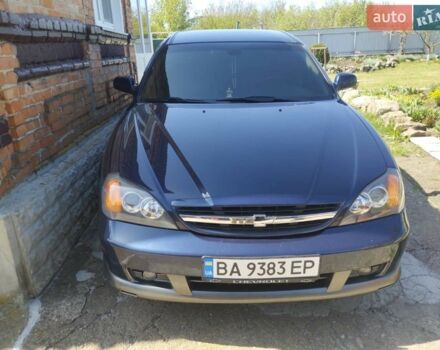Синій Шевроле Еванда, об'ємом двигуна 2 л та пробігом 175 тис. км за 5500 $, фото 1 на Automoto.ua