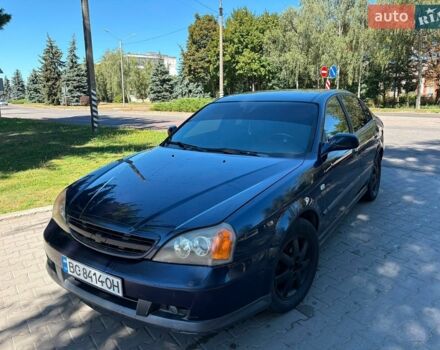 Синий Шевроле Эванда, объемом двигателя 2 л и пробегом 276 тыс. км за 2250 $, фото 1 на Automoto.ua
