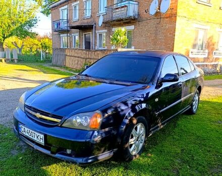 Синій Шевроле Еванда, об'ємом двигуна 2 л та пробігом 28 тис. км за 2299 $, фото 1 на Automoto.ua