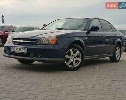 Синий Шевроле Эванда, объемом двигателя 2 л и пробегом 301 тыс. км за 4540 $, фото 1 на Automoto.ua