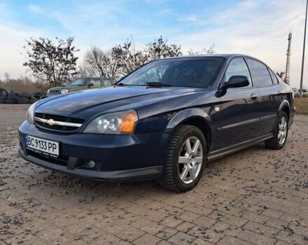 Синий Шевроле Эванда, объемом двигателя 2 л и пробегом 300 тыс. км за 4099 $, фото 1 на Automoto.ua