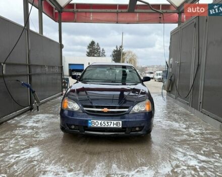 Синій Шевроле Еванда, об'ємом двигуна 2 л та пробігом 320 тис. км за 2499 $, фото 1 на Automoto.ua