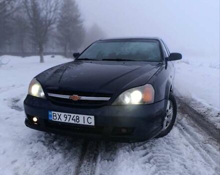 Синій Шевроле Еванда, об'ємом двигуна 2 л та пробігом 330 тис. км за 3450 $, фото 1 на Automoto.ua