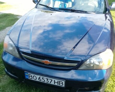 Синій Шевроле Еванда, об'ємом двигуна 2 л та пробігом 320 тис. км за 2100 $, фото 1 на Automoto.ua