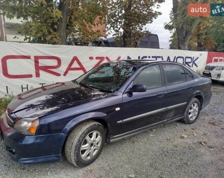 Синий Шевроле Эванда, объемом двигателя 2 л и пробегом 320 тыс. км за 2700 $, фото 1 на Automoto.ua