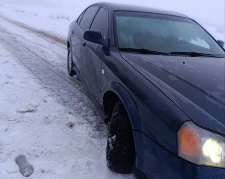 Синий Шевроле Эванда, объемом двигателя 2 л и пробегом 324 тыс. км за 3000 $, фото 1 на Automoto.ua