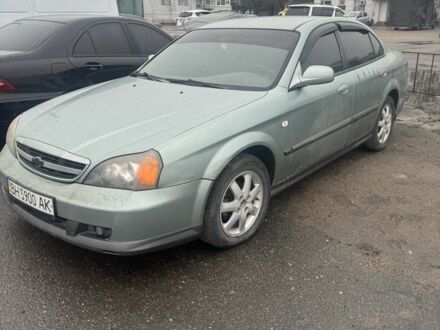 Синий Шевроле Эванда, объемом двигателя 1.8 л и пробегом 200 тыс. км за 1000 $, фото 1 на Automoto.ua