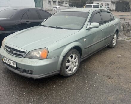 Синий Шевроле Эванда, объемом двигателя 1.8 л и пробегом 200 тыс. км за 1000 $, фото 1 на Automoto.ua