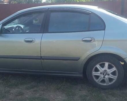 Зелений Шевроле Еванда, об'ємом двигуна 2 л та пробігом 212 тис. км за 3700 $, фото 2 на Automoto.ua