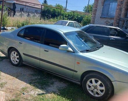 Зелений Шевроле Еванда, об'ємом двигуна 2 л та пробігом 330 тис. км за 3600 $, фото 6 на Automoto.ua