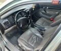 Зелений Шевроле Еванда, об'ємом двигуна 2 л та пробігом 300 тис. км за 2950 $, фото 11 на Automoto.ua