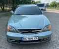 Зелений Шевроле Еванда, об'ємом двигуна 2 л та пробігом 300 тис. км за 2666 $, фото 1 на Automoto.ua