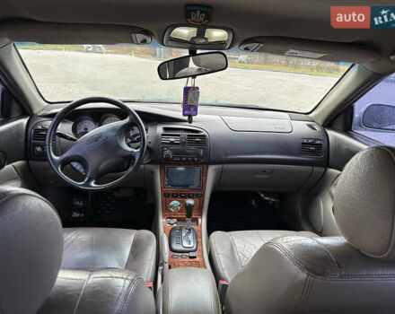 Зеленый Шевроле Эванда, объемом двигателя 2 л и пробегом 240 тыс. км за 1750 $, фото 10 на Automoto.ua