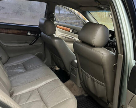 Зелений Шевроле Еванда, об'ємом двигуна 2 л та пробігом 242 тис. км за 1299 $, фото 6 на Automoto.ua