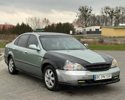 Зеленый Шевроле Эванда, объемом двигателя 2 л и пробегом 240 тыс. км за 1750 $, фото 2 на Automoto.ua