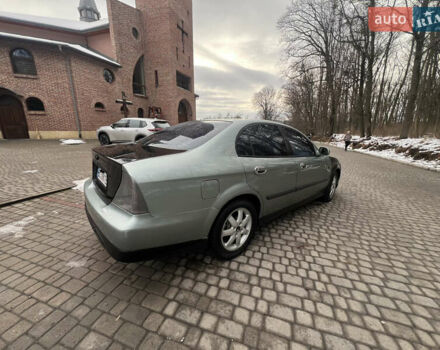 Зеленый Шевроле Эванда, объемом двигателя 2 л и пробегом 245 тыс. км за 1750 $, фото 3 на Automoto.ua