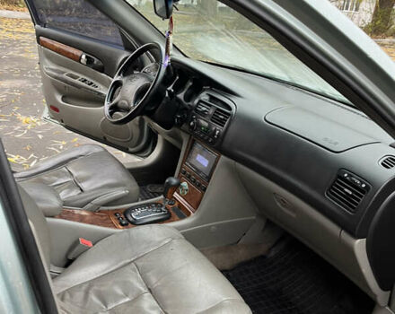 Зелений Шевроле Еванда, об'ємом двигуна 2 л та пробігом 242 тис. км за 1299 $, фото 7 на Automoto.ua