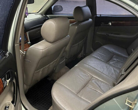 Зелений Шевроле Еванда, об'ємом двигуна 2 л та пробігом 242 тис. км за 1299 $, фото 5 на Automoto.ua