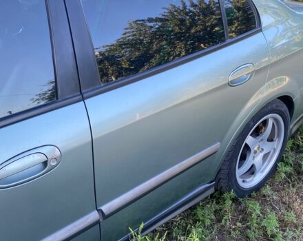 Зелений Шевроле Еванда, об'ємом двигуна 2 л та пробігом 180 тис. км за 5900 $, фото 1 на Automoto.ua
