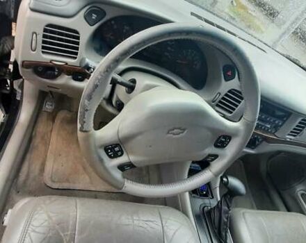 Черный Шевроле Импала, объемом двигателя 3.79 л и пробегом 251 тыс. км за 6400 $, фото 7 на Automoto.ua