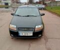Черный Шевроле Калос, объемом двигателя 1.4 л и пробегом 209 тыс. км за 2600 $, фото 1 на Automoto.ua