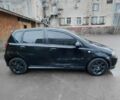 Черный Шевроле Калос, объемом двигателя 1.4 л и пробегом 104 тыс. км за 2000 $, фото 4 на Automoto.ua
