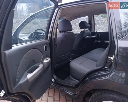 Черный Шевроле Калос, объемом двигателя 1.4 л и пробегом 167 тыс. км за 5299 $, фото 13 на Automoto.ua