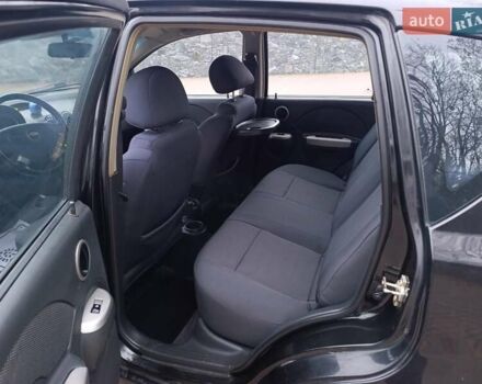 Черный Шевроле Калос, объемом двигателя 1.4 л и пробегом 167 тыс. км за 5299 $, фото 19 на Automoto.ua