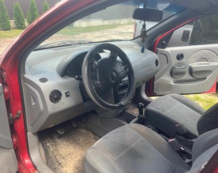 Красный Шевроле Калос, объемом двигателя 1.3 л и пробегом 500 тыс. км за 2000 $, фото 12 на Automoto.ua