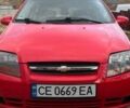 Красный Шевроле Калос, объемом двигателя 1.1 л и пробегом 210 тыс. км за 3800 $, фото 1 на Automoto.ua