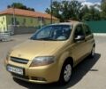 Желтый Шевроле Калос, объемом двигателя 1.2 л и пробегом 120 тыс. км за 2900 $, фото 1 на Automoto.ua
