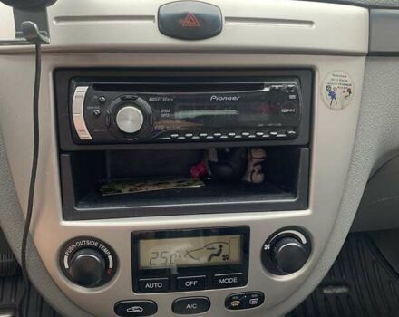 Белый Шевроле Лачетти, объемом двигателя 1.8 л и пробегом 206 тыс. км за 4700 $, фото 18 на Automoto.ua