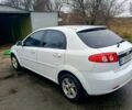 Белый Шевроле Лачетти, объемом двигателя 1.6 л и пробегом 180 тыс. км за 5600 $, фото 2 на Automoto.ua